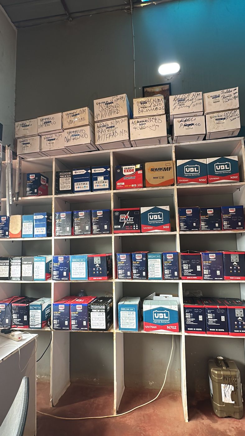 Fully stocked shelves of UBL, Chloride Exide, Coronix and Shield car batteries at Makanga Auto Centre