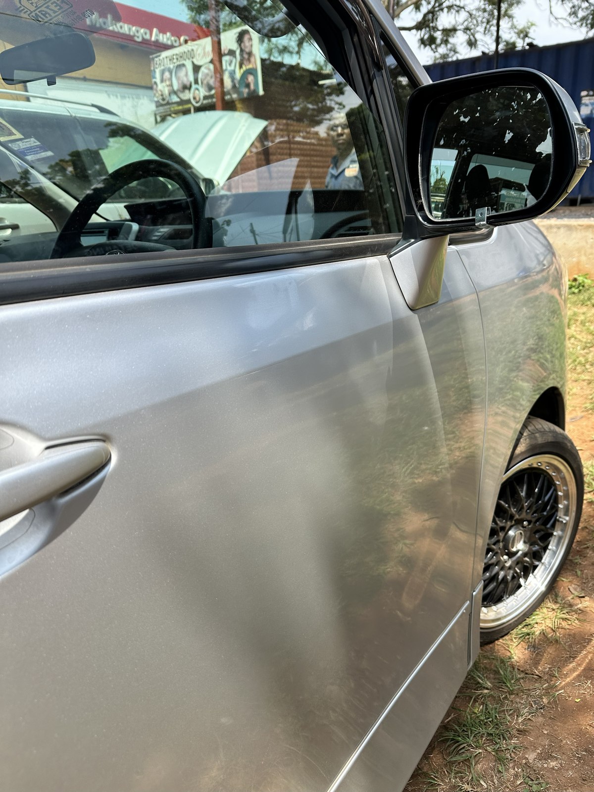 Customer vehicle fitted with custom alloy wheels at Makanga Auto Centre